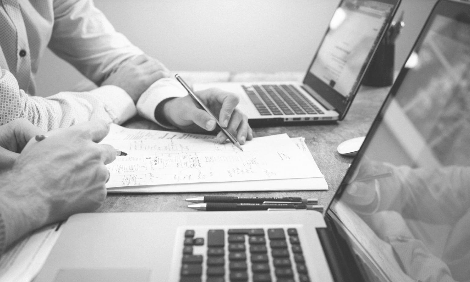 Financial analysis workspace with budget trend charts and data visualization